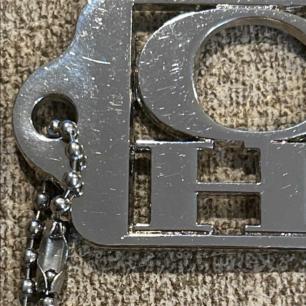 Coach 70th Anniversary Metal Hangtag Bag Charm Cutout - Silver Tone - Picture 2 of 5